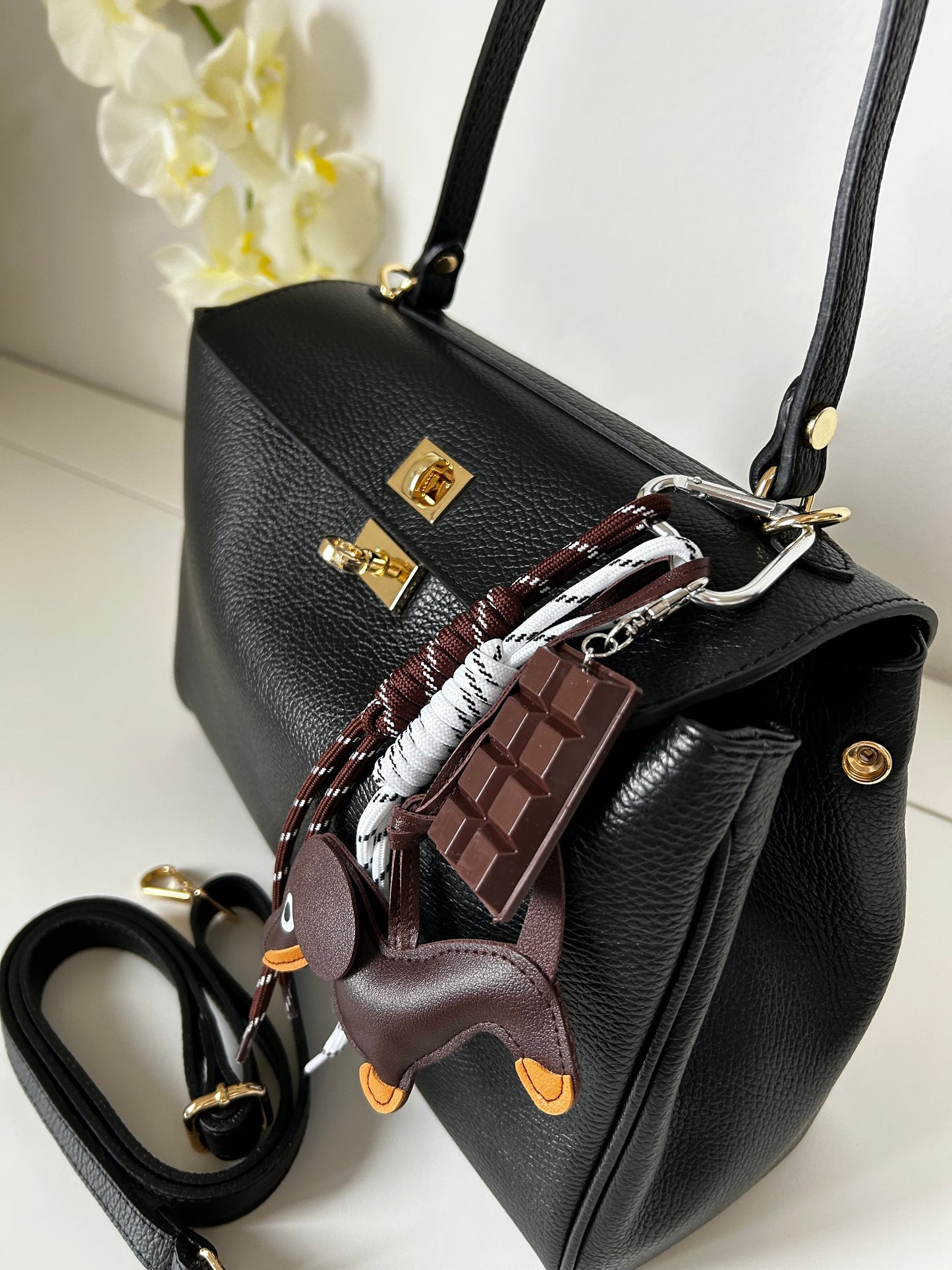KIM IN PELLE NERA con Charm in omaggio