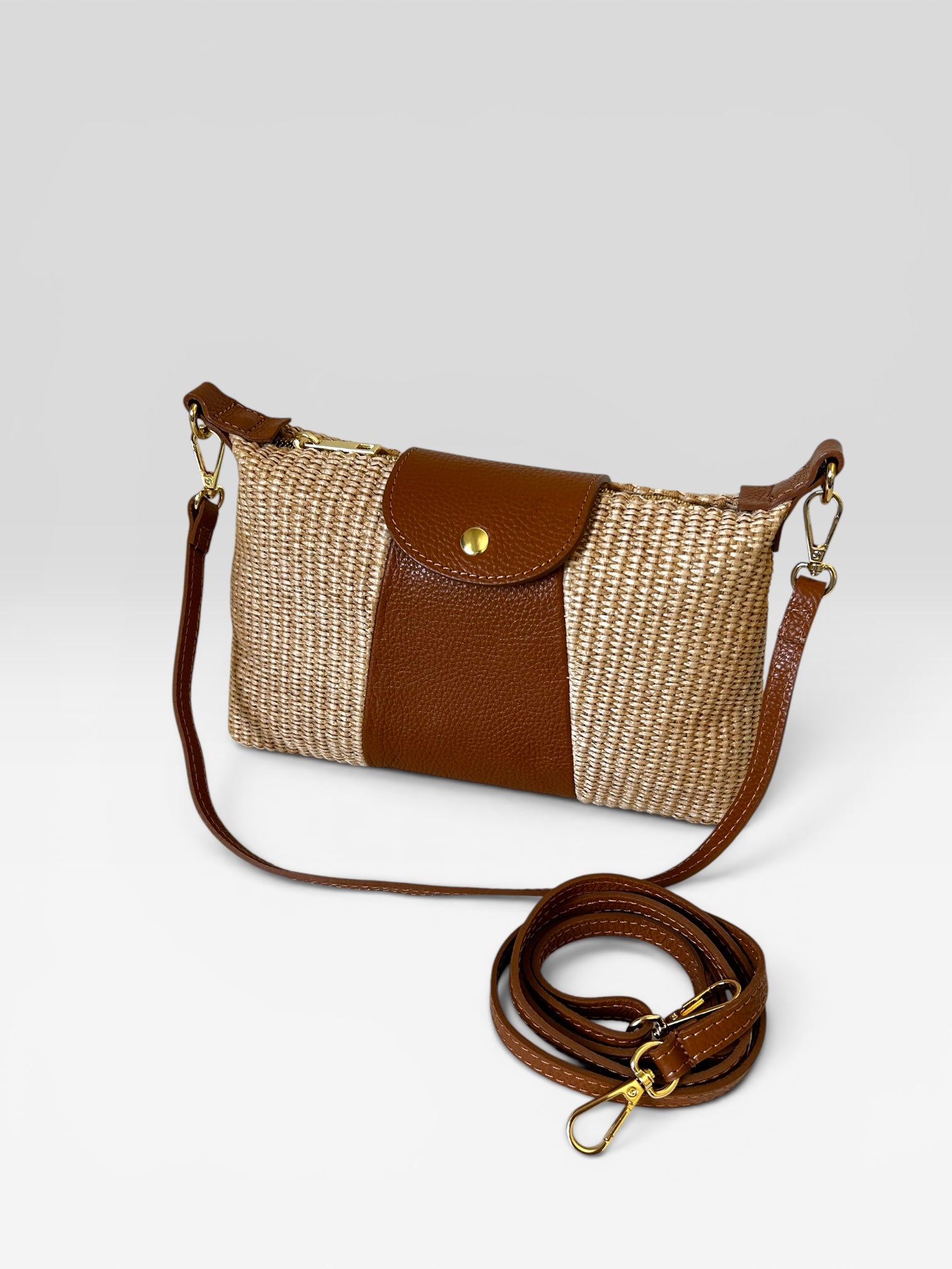POCHETTE IN PELLE E RAFIA