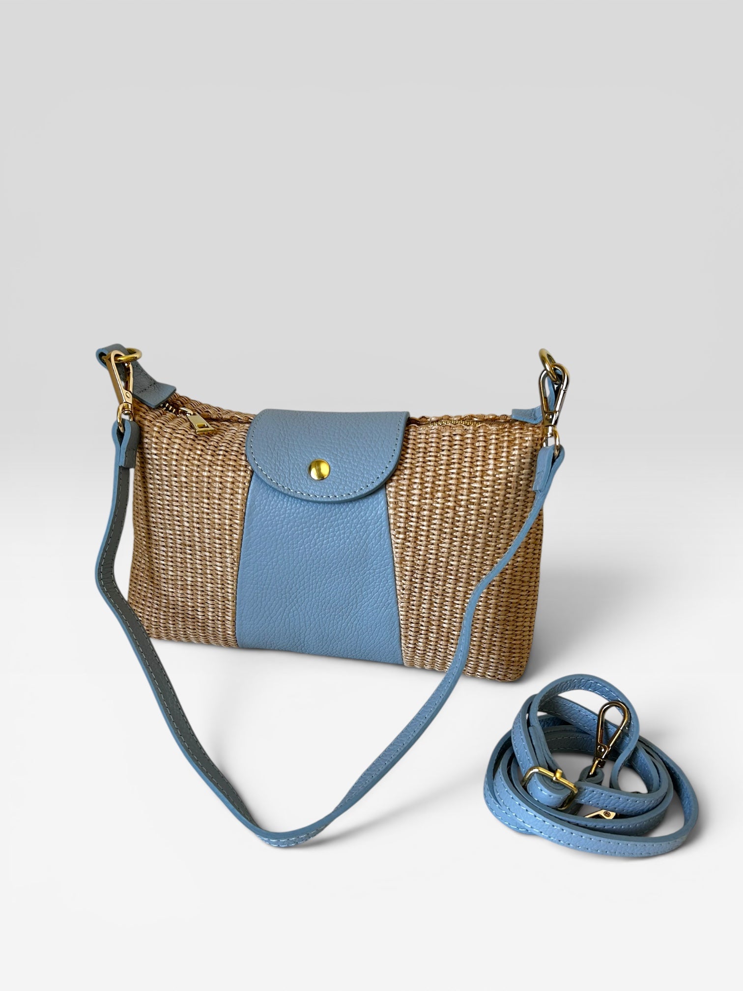 POCHETTE IN PELLE E RAFIA